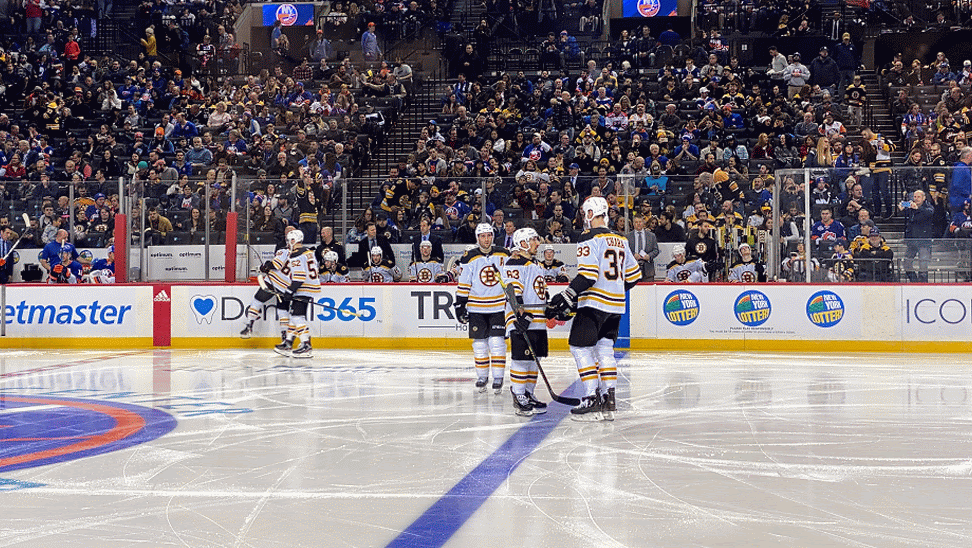 quick animation of Brad Marchand and Zdeno Chara of the Boston Bruins on the ice at Barclay Center in 2019